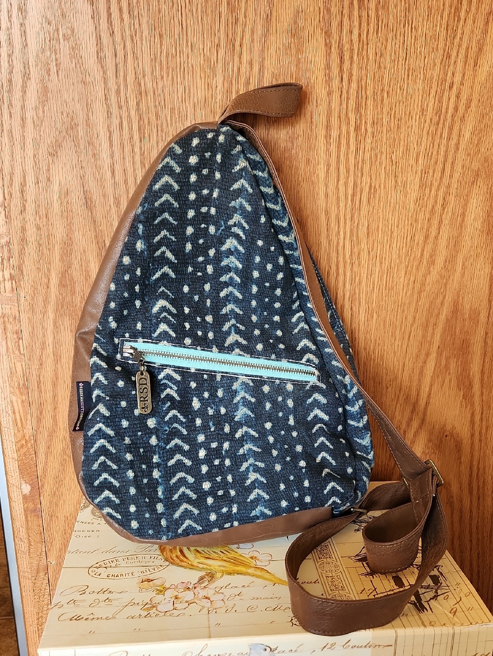 Indigo Patterned Canvas Sling Backpack with Brown Trim by RSD